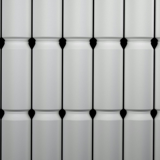 A close up of a white wall with black dots