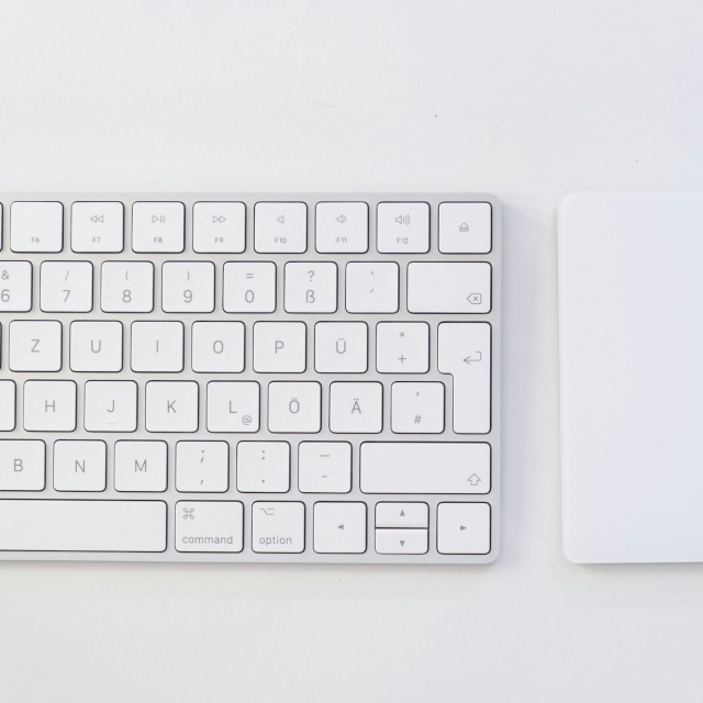 White apple keyboard on white table